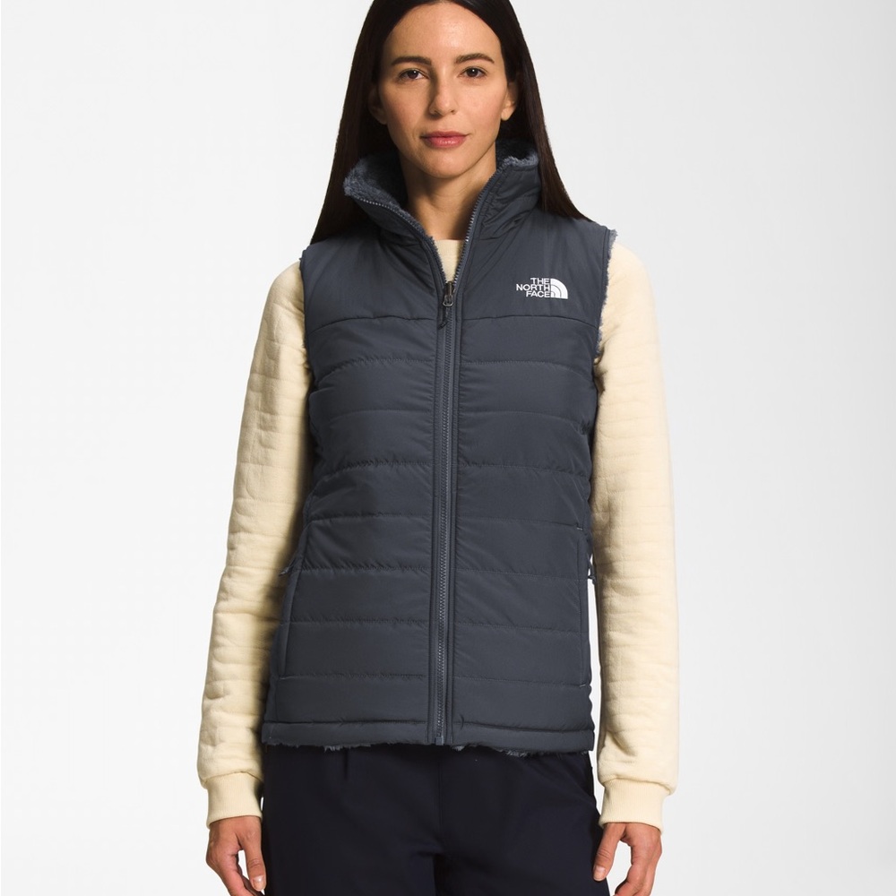 PRE-OWNED SIZE S/M The North Face Women's Blue and Cream reversible Vest